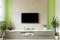 Modern living room interior - tv mounted on brick wall with black screen Royalty Free Stock Photo