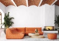 Modern living room loft with orange leather sofa and brick ceiling Royalty Free Stock Photo