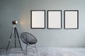 Modern living room with three empty picture frames Royalty Free Stock Photo