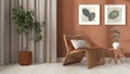 Modern living room in white and orange tones. Close up. Rattan armchair with pillows, curtains, pictures and potted plant. Parquet Royalty Free Stock Photo