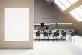 Modern loft kitchen interior with blank white mock up banner on wall, window and daylight, concrete flooring, furniture and dining Royalty Free Stock Photo