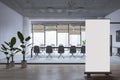 Modern loft meeting room interior with empty white mock up banner, window and city view, furniture, equipment, various other Royalty Free Stock Photo