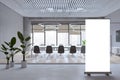 Modern loft meeting room interior with empty white mock up poster, window and city view, furniture, equipment, various other Royalty Free Stock Photo