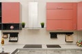 Modern loft style kitchen with hob, fume hood and table with countertop