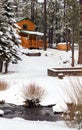 Modern Log Cabin Home In The Winter Woods