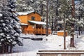 Modern Log Cabin Home In The Winter Woods Royalty Free Stock Photo