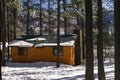 Modern Log Cabin Home In The Winter Woods Royalty Free Stock Photo