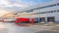 modern logistics center, light Industrial building and warehouse with trucks Royalty Free Stock Photo