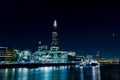 Modern London skyline at night on River Thames Royalty Free Stock Photo