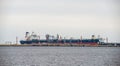 Big cargo or tanker ship mooring in port of Gdansk