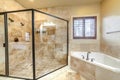 Modern luxury bathroom with glass shower cubicle Royalty Free Stock Photo