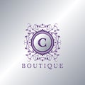 Modern Luxury Boutique Letter C logo. Unique elegance design floral ornament with purple metal circle frame vector design