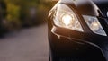 Modern luxury car headlights closeup. Royalty Free Stock Photo