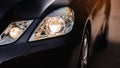 Modern luxury car headlights closeup. Royalty Free Stock Photo