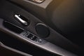 Door card with buttons. Modern luxury car Interior - steering wheel, shift lever and dashboard. Royalty Free Stock Photo