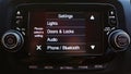 Modern luxury car interior. Touch Screen monitor with settings. Shallow dof