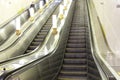 Modern luxury escalators . video of a moving excavator steps changing. with staircase in a shopping mall Metal excavator Royalty Free Stock Photo