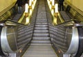 Modern luxury escalators . video of a moving excavator steps changing. with staircase in a shopping mall Metal excavator Royalty Free Stock Photo