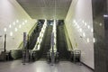 Modern luxury escalators . video of a moving excavator steps changing. with staircase in a shopping mall Metal excavator Royalty Free Stock Photo