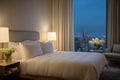 Modern luxury hotel bedroom interior with night city lights filtering through sheer curtains. minimalist elegance and Royalty Free Stock Photo