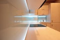 Modern luxury kitchen with white LED lighting Royalty Free Stock Photo