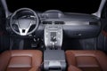 Modern luxury prestige car interior, dashboard, steering wheel. Black leather interior. Royalty Free Stock Photo