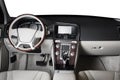 Modern luxury prestige car interior, dashboard, steering wheel.