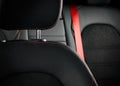 Modern luxury race car black leather with red stitch
