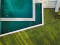 Modern luxury villa with luxurious swimming pool, top view architecture Royalty Free Stock Photo