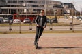 Modern man riding electric scooter in the city Royalty Free Stock Photo