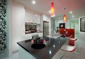 Modern mansion through the kitchen with red lamps Royalty Free Stock Photo