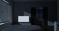 Modern master bedroom with white screen tv and balcony or patio area at night Royalty Free Stock Photo