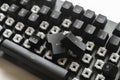 a modern mechanical keyboard switches, black and white keycaps on the desk Royalty Free Stock Photo