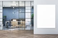 Modern meeting room interior with white mock up banner on wall, glass partition, wooden flooring and bookcase. Royalty Free Stock Photo