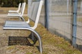 Modern metal benches in park Royalty Free Stock Photo