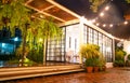 Modern metal White building made from shipping house containers at night