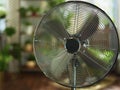 Modern metallic floor stand electric fan