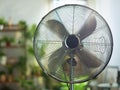 Modern metallic floor stand electric fan