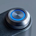 Modern Metallic Push Button with Blue LED Light Royalty Free Stock Photo
