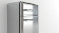 A modern metallic refrigerator featuring two doors and a convenient drawer. Ideal for storing and organizing food items Royalty Free Stock Photo