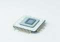 Modern microchip with intricate circuit design on a light background