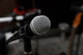 Modern microphone at recording studio, closeup with space for text. Music band practice Royalty Free Stock Photo