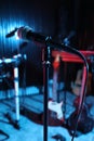 Modern microphone at recording studio, color toned. Music band practice Royalty Free Stock Photo