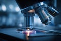 Modern Microscope Closeup in Blue Laboratory Setting Royalty Free Stock Photo