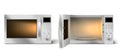 Modern microwave oven with lit lamp inside