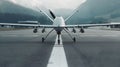Modern military grey predator drone ready for takeoff on the runway, equipped with cutting-edge technology for Royalty Free Stock Photo