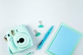 Modern mini camera, school or collage accessories on background. Fashion blogger, minimal concept Royalty Free Stock Photo