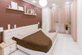 Modern minimalism style bedroom interior in light warm tones Royalty Free Stock Photo