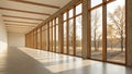 Sunlit modern hallway with large windows and autumn trees. Royalty Free Stock Photo