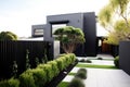modern, minimalist house exterior with minimalist garden and sleek black fence